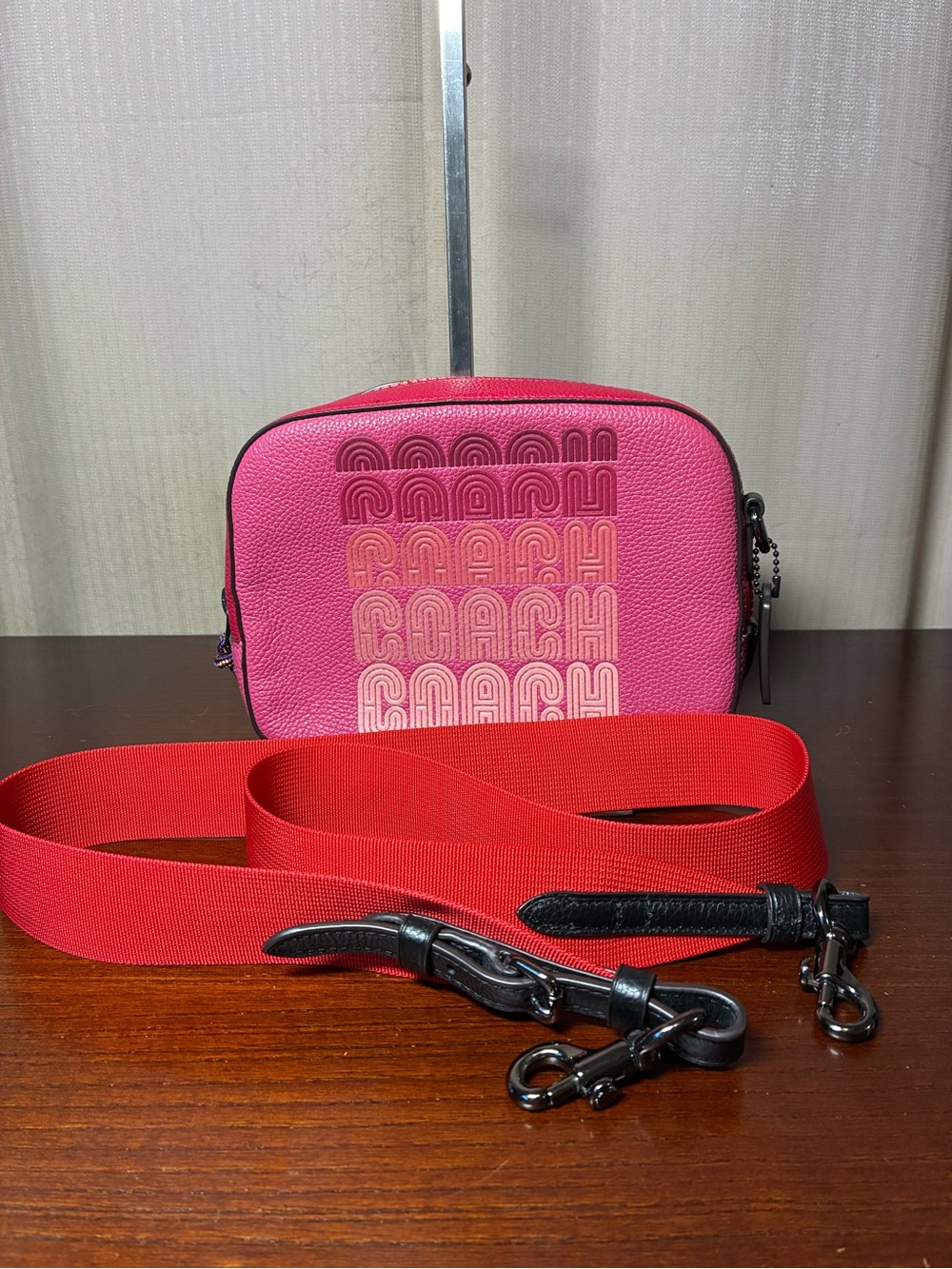 Coach Pink Crossbody Bag with Red Strap